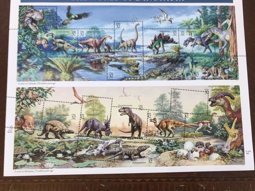 U.S.A. Michel 2814–28 ★★, 1997 Dinosaurs. Sheet with 15 stamps incl. seven lower stamps with heavily misplaced print. SCARCE.