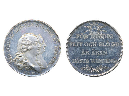 Medals, regal, Sweden. Adolf Fredrik, Hild. 55, Adolf Fredrik, silver medal, 34 mm, 18.47 g. Obv: Bust of King and Queen facing right, by C.J. Wikman. Rev: FÖR DYGDIG FLIT OCH SLÖGD ÄR ÄRAN BÄSTA WINNING, engraved by D. Fehrman (1753). The medal issued as an award for excellent factory work. Lightly cleaned. 01.