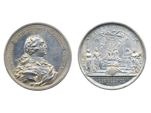 Medals, regal, Sweden. Adolf Fredrik, Hild. 20, Adolf Fredrik, silver medal, 52 mm, 61.46 g. Obv: Bust of King facing right, engraver signature D.F. Rev: FIDES MUTUA above coronation view from church. Issued to commemorate the coronation of King Adolf Fredrik 26 March 1751. Superb example with full lustre, minor contact marks. Note that the portrait is slightly different to that of consecutive lot. Hildebrand does note in his comments that there are minor engraving differences on this medal. 01/0.