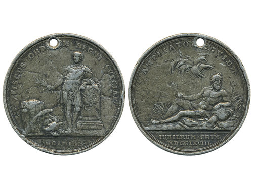 Medals, regal, Sweden. Adolf Fredrik, Hild. 45, Medal in pewter, 62 mm, 66.42 g. Obv: Standing young man with olive branch, engraver signature G.L. (G Ljungberger). Rev: AMPLIATOR CIVIUM above palm tree and God of Rivers (Nile). Medal pierced and with many nicks and contact marks. 1.