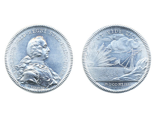 Medals, regal, Sweden. Adolf Fredrik, Hild. 6, Adolf Fredrik, medal in white metal, 35 mm, 4.98 g. Engraved by Daniel Fehrman, issued 1743 to commemorate/celebrate the arrival of Prince Adolf Fredrik in Stockholm. Obv: Portrait facing right. Rev: UT VIDI VICI above sea view with radiant sun and sailing vessel behind coastline. Superb example with full mint lustre. 01/0.