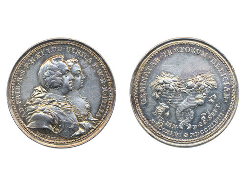 Medals, regal, Sweden. Adolf Fredrik, Hild. 14, Adolf Fredrik, silver medal, 35 mm, 18.73 g. Issued to Prince Carl's Birth 26.9.1748, engraved by Daniel Fehrman. Obv: Bust of Adolf Fredrik facing right. Rev: Two cornucopiae with text GEMINATAE TEMPORVM DELICIAE above. Slightly cleaned, minor rim nick on reverse. 1+/01.
