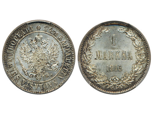 Coins, Finland. Nicholas II, KM 3.2, 1 markka 1915. Lustrous example with beautiful toning. Graded by PCGS as MS65. 01/0.